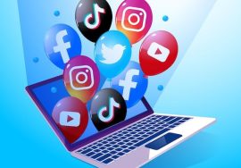 Balloon with social media logo icon out of the laptop Premium Vector